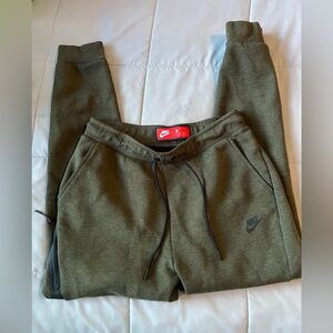 army green Nike jogger pants